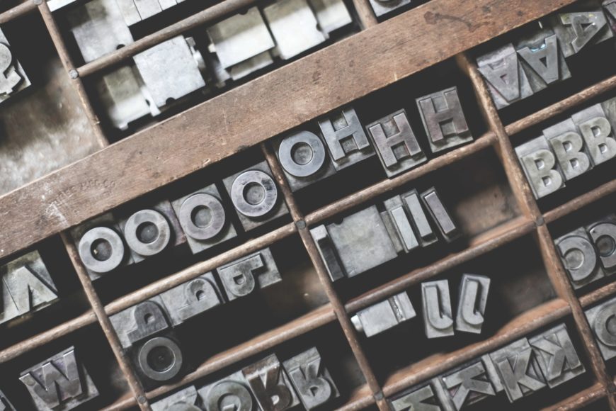 Printing press preparing typography