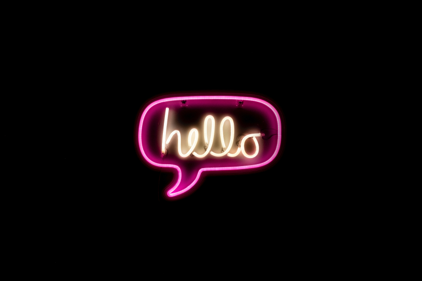 A neon sign that reads hello